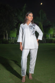 Chic White Floral Print Co-ord Set with Button-Down Shirt and Tapered Pants (Set of 2) - Vanika