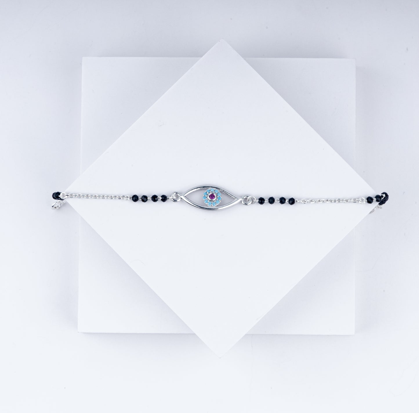 Mystic Iris Rakhi – 925 Sterling Silver Evil Eye with Pink-Blue Accent