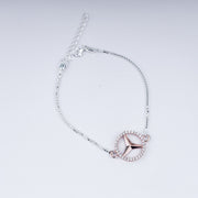 TriAura Rakhi – Rose Gold Accent in 925 Silver