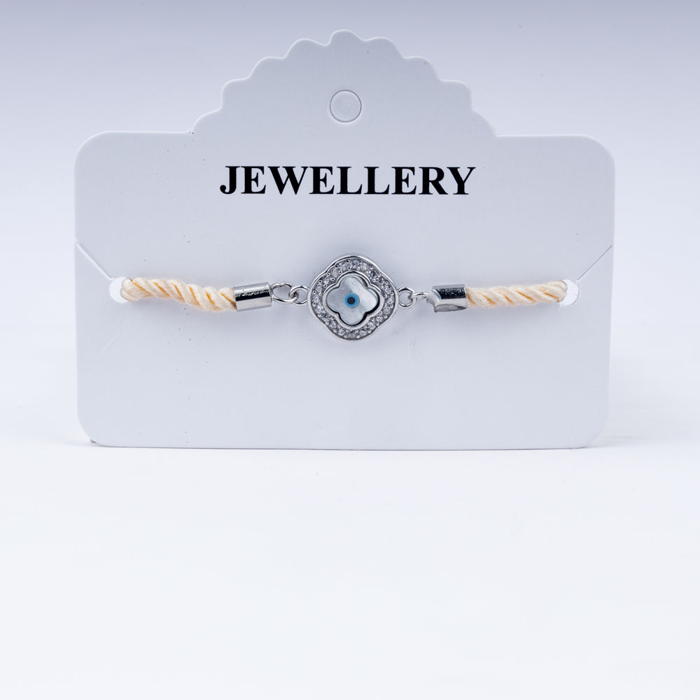 Sunny Side Up – 925 Silver Evil Eye Rakhi on Peach Twist