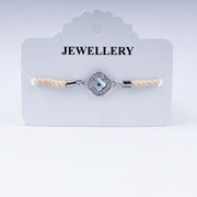 Sunny Side Up – 925 Silver Evil Eye Rakhi on Peach Twist