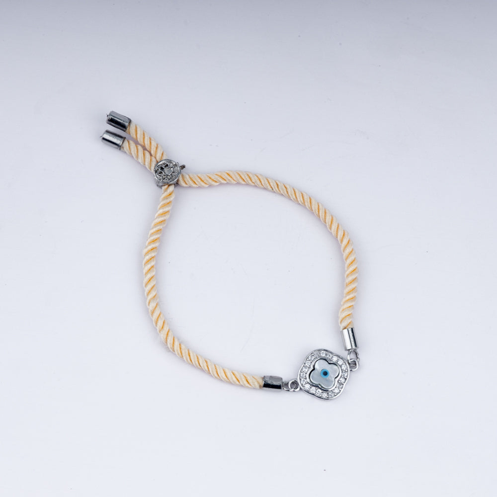 Sunny Side Up – 925 Silver Evil Eye Rakhi on Peach Twist
