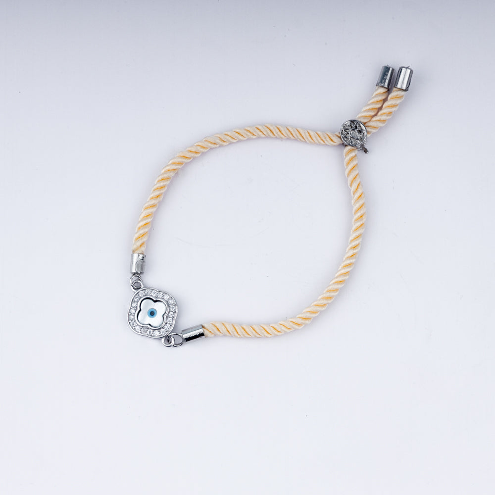Sunny Side Up – 925 Silver Evil Eye Rakhi on Peach Twist